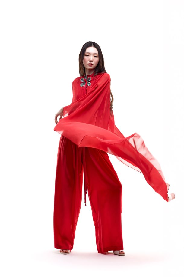 Roberta Redaelli spring summer 2026, RD516 Silk georgette cape with flared sleeves corallo